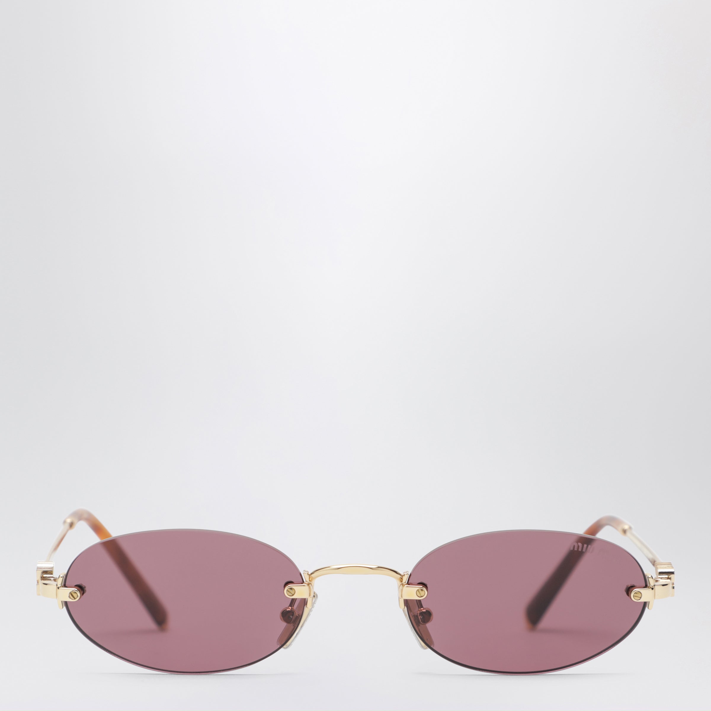 Miu Miu Logo sunglasses in goldyellow Miu Miu Logo sunglasses in goldyellow