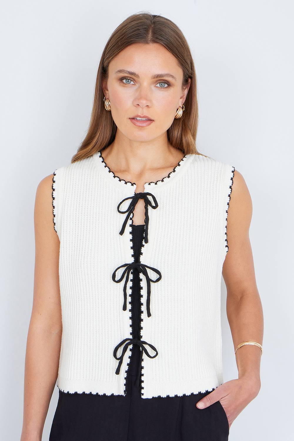 Yumi Ivory Knitted Waistcoat With Bow Trims Yumi Ivory Knitted Waistcoat With Bow Trims