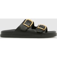 schuh Trish Buckle Footbed Sandals in Black schuh Trish Buckle Footbed Sandals in Black